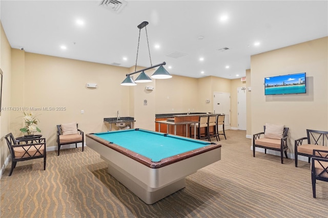 recreation room featuring bar, pool table, and carpet