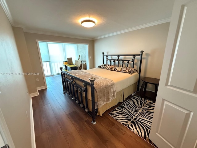 bedroom with ornamental molding and dark hardwood / wood-style flooring