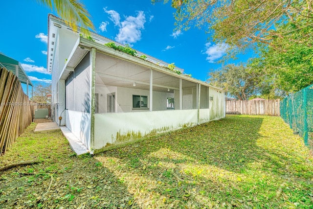 view of home's exterior featuring a yard