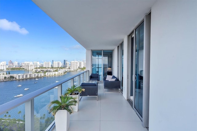 balcony featuring a water view