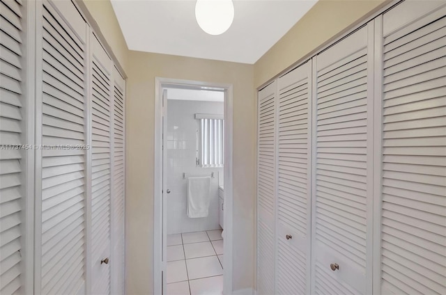 bathroom featuring tile patterned flooring