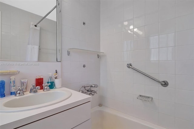 bathroom with vanity and shower / bathtub combination with curtain