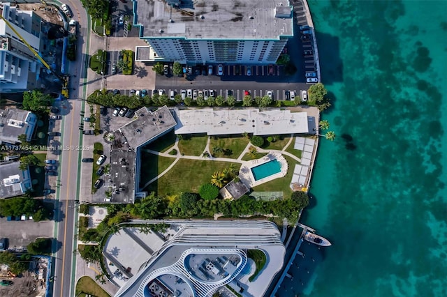 birds eye view of property featuring a water view