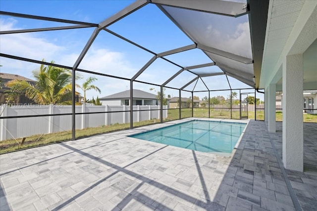 view of pool with a lanai and a patio area