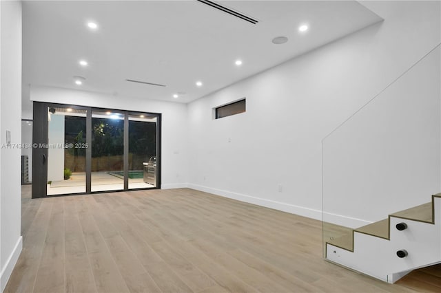 empty room with light wood-type flooring