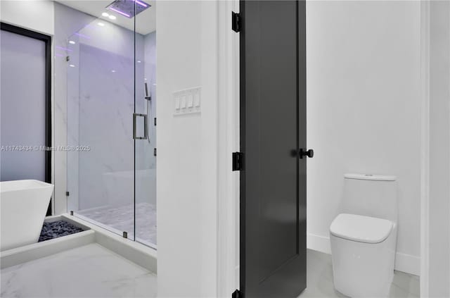 bathroom featuring toilet and plus walk in shower