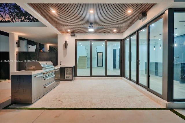 interior space featuring wine cooler and sink