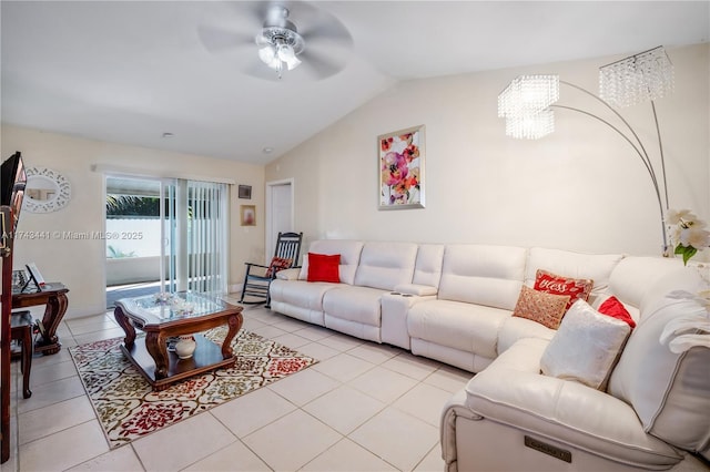 living room with lofted ceiling, light tile patterned floors, and ceiling fan