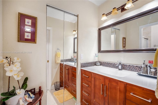 bathroom with tile patterned flooring and vanity