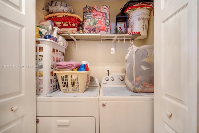 laundry room with washer and dryer