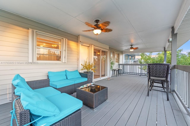 deck with ceiling fan and an outdoor hangout area