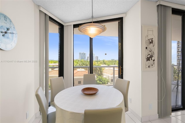 20281 E Country Club Dr Unit 403, Aventura, FL 33180 - dining room with light tile patterned flooring and floor to ceiling windows