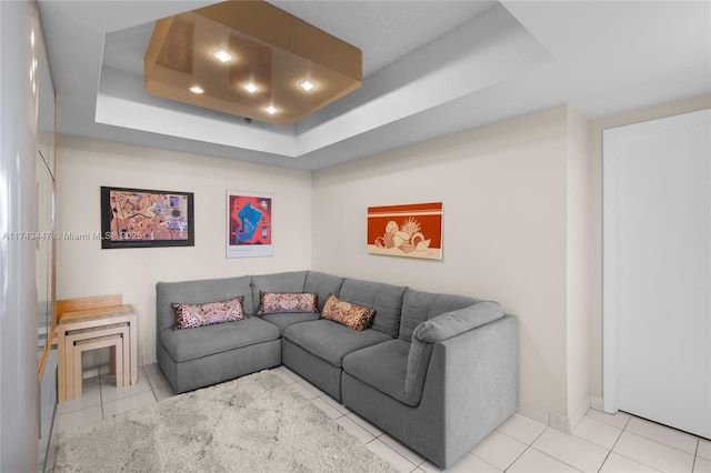 20281 E Country Club Dr Unit 403, Aventura, FL 33180 - living area featuring a tray ceiling, baseboards, and tile patterned flooring