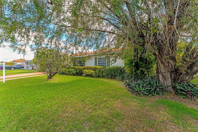 view of front of home with a front yard