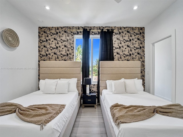 bedroom featuring light hardwood / wood-style floors