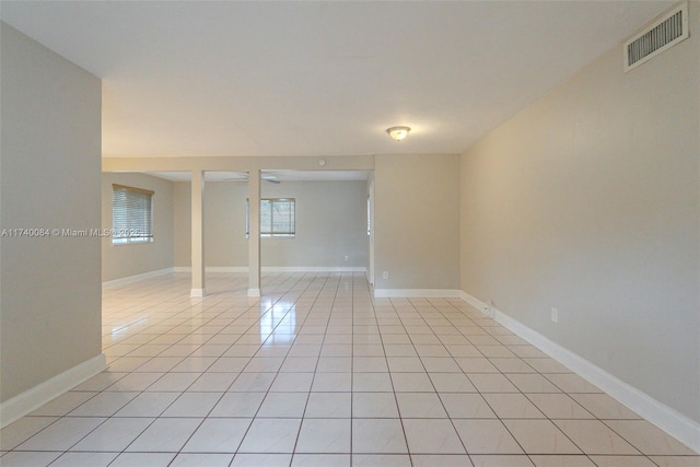 spare room with light tile patterned floors