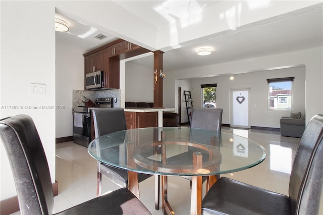 view of tiled dining space