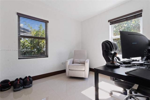 home office with light tile patterned flooring