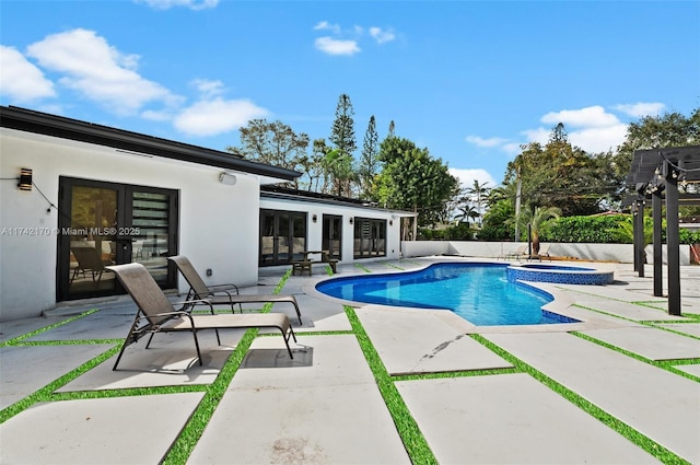 view of swimming pool featuring a pergola, a patio area, french doors, and an in ground hot tub