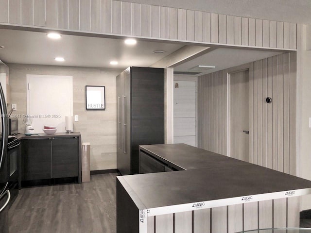 kitchen with dark hardwood / wood-style flooring