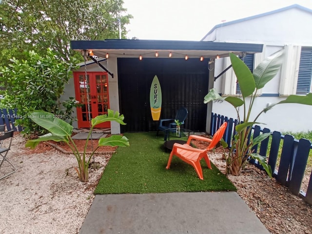 view of yard featuring french doors