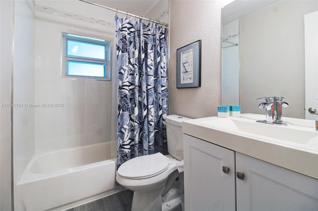 full bathroom featuring vanity, hardwood / wood-style flooring, toilet, and shower / bath combo with shower curtain