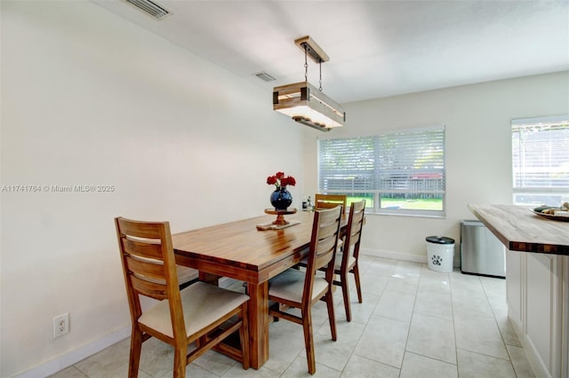 view of tiled dining room