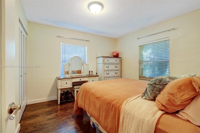 bedroom featuring dark hardwood / wood-style floors