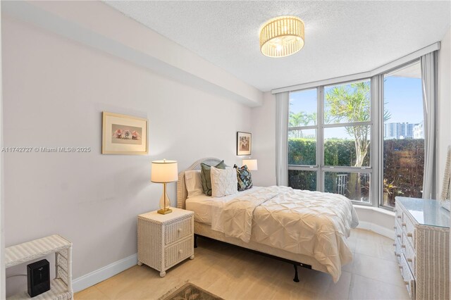 bedroom featuring a textured ceiling