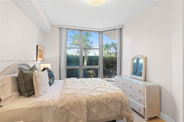 bedroom with expansive windows