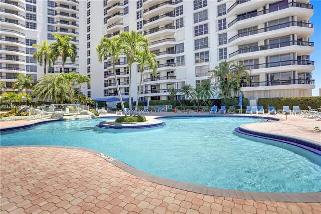 view of swimming pool featuring a patio area