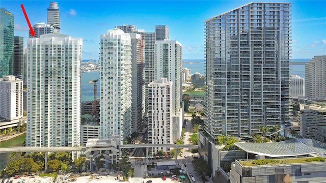 property's view of city featuring a water view