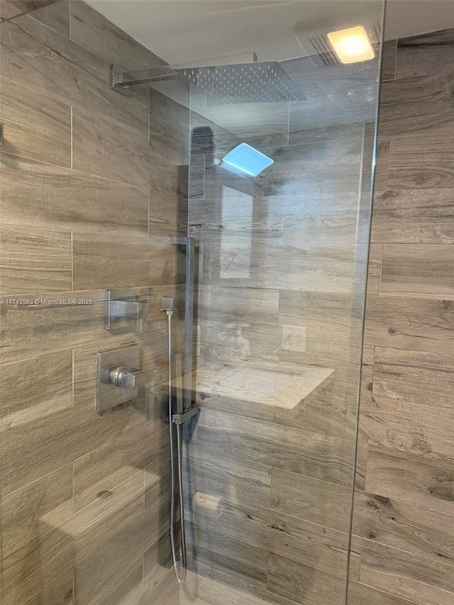 full bath featuring walk in shower