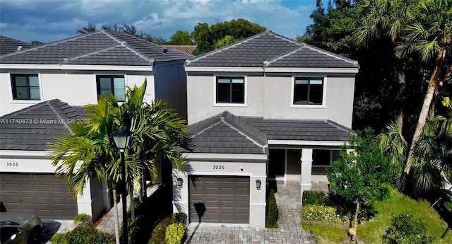 view of front of property with a garage