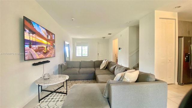 living room featuring light tile patterned flooring