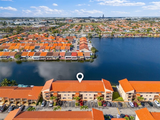 drone / aerial view with a water view