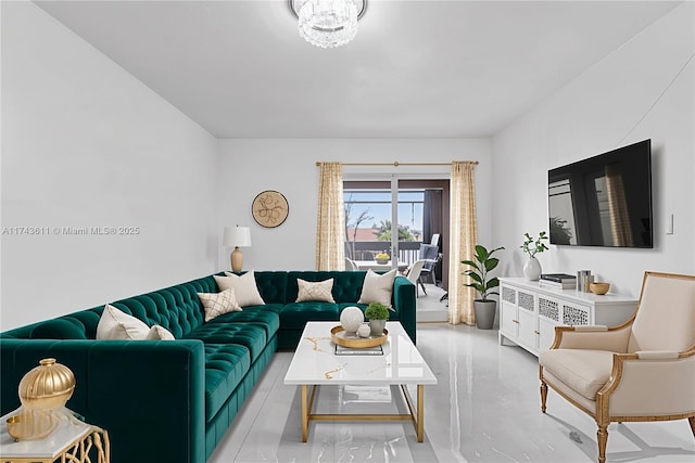 living room with a notable chandelier