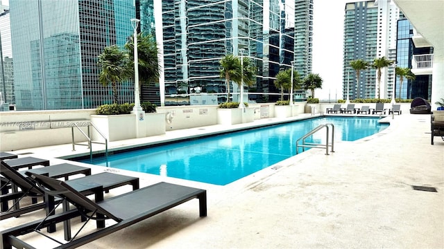 1200 Brickell Bay Dr Unit 2216, Miami, FL 33131 - community pool featuring a patio area