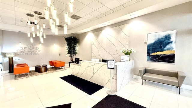 1200 Brickell Bay Dr Unit 2216, Miami, FL 33131 - reception featuring a paneled ceiling and a chandelier