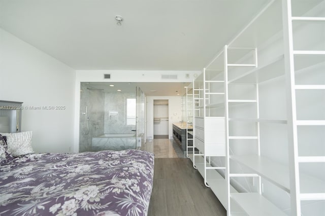 bedroom featuring dark wood-type flooring