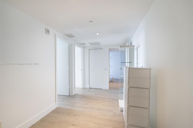 hall featuring light hardwood / wood-style flooring