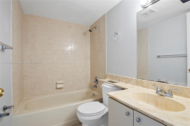 bathroom featuring vanity, bathtub / shower combination, toilet, and visible vents