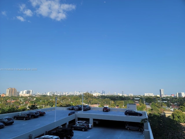 exterior space with a balcony and a city view