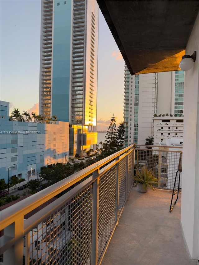 view of balcony at dusk