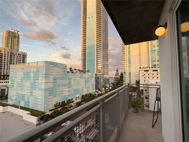 view of balcony at dusk