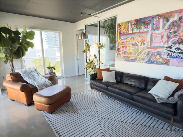 living room featuring concrete floors