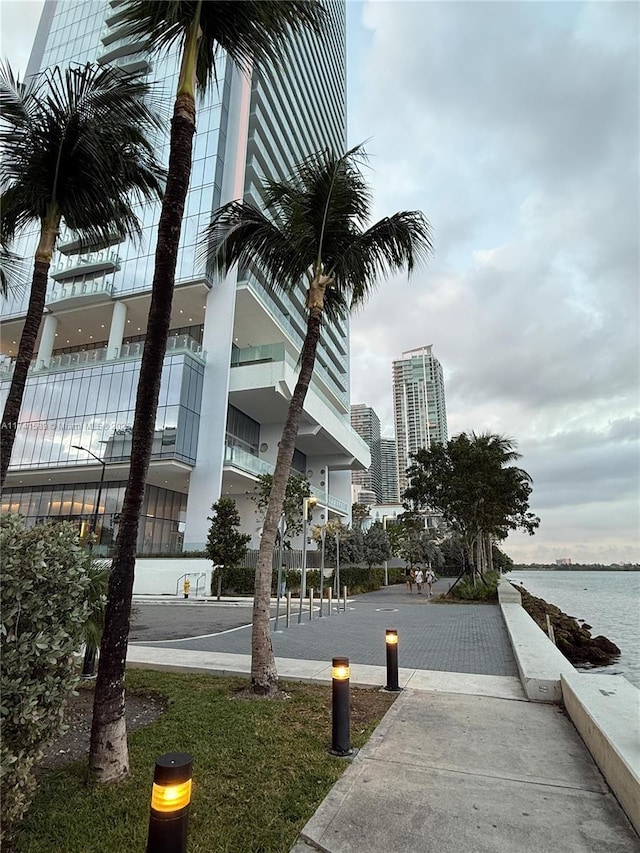 view of building exterior featuring a water view