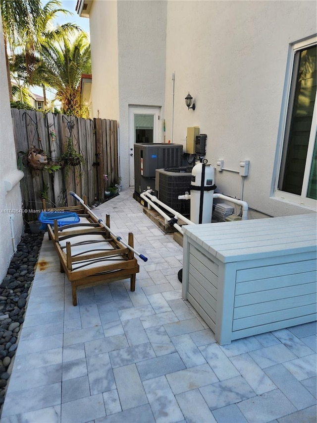 view of patio with central AC unit