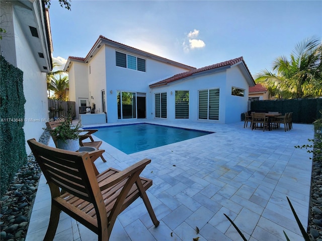 view of pool featuring a patio