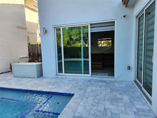 view of swimming pool with a patio